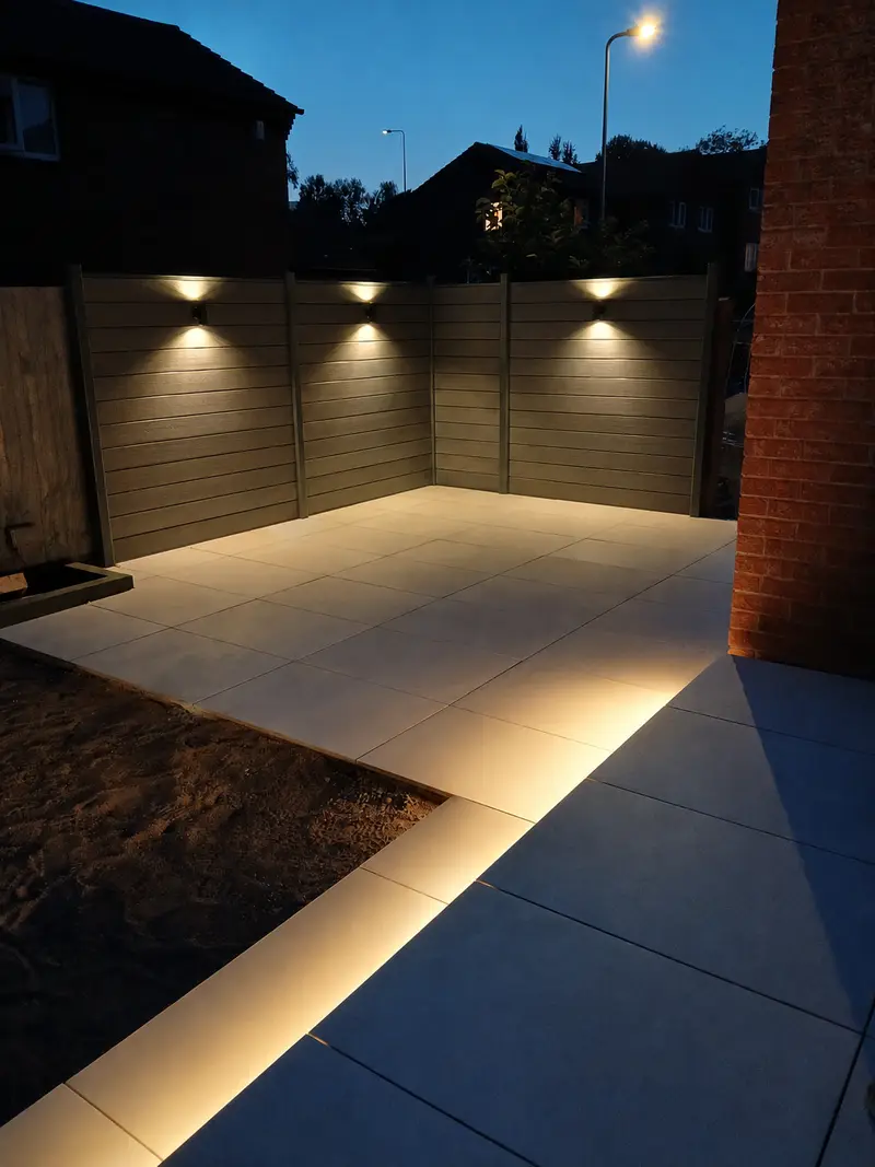 LED strip lighting tracing the edge of the porcelain path at dusk
